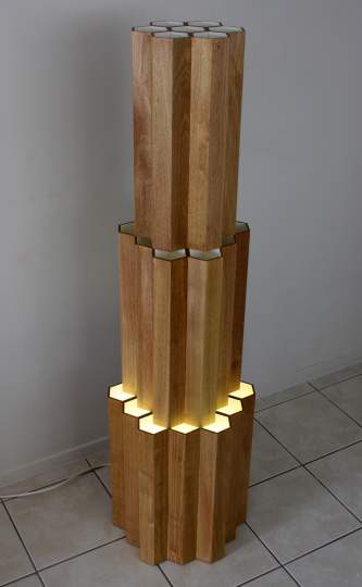 Milk and Honey.   2011, recycled tawa and flourescent lamp.   web